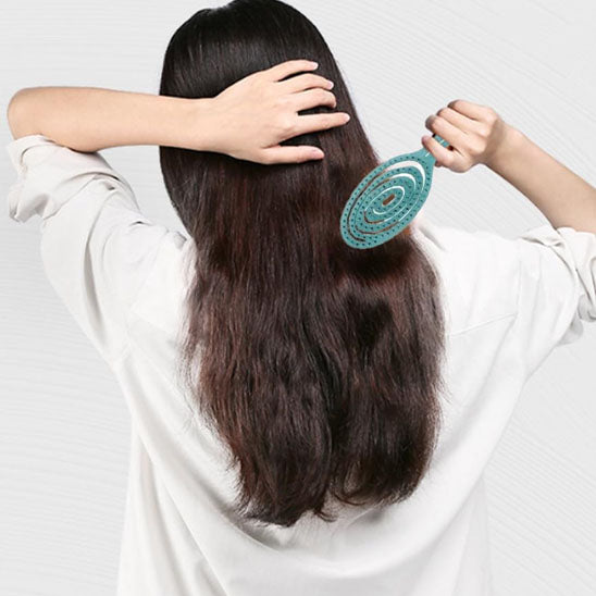 brosse a cheveux boucles arriere
